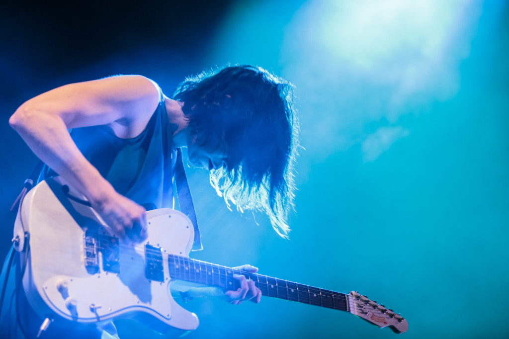 Carrie Brownstein of Sleater-Kinney plays guitar at Pitchfork Music Festival in Chicago in July 2015. Photo by Ben Stas